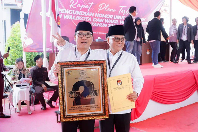 Pasangan Calon Wali Kota Metro Nomor Urut 2 Wahdi Sirajuddin-Qomaru Zaman
