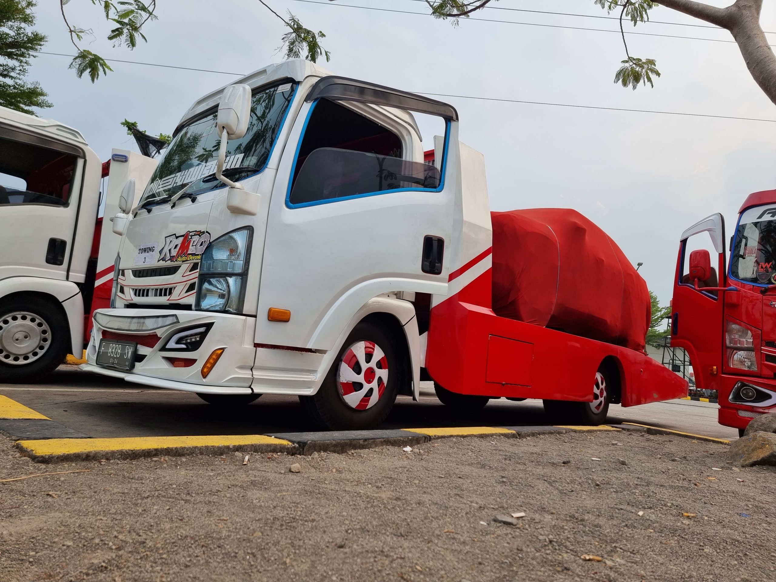 Ilustrasi Jasa Pengantaran Mobil. (Ist)