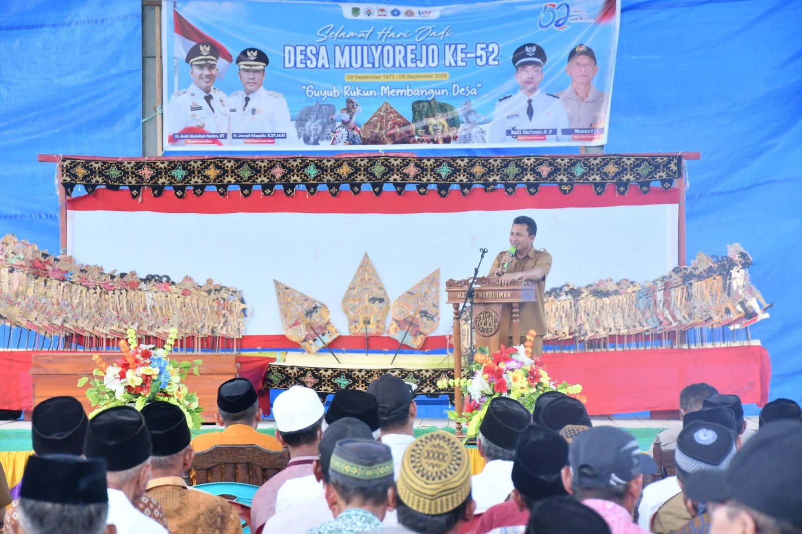 Bupati Luwu Utara, Andi Abdullah Rahim, Saat Memberikan Sambutan dalam Peringatan Hari Jadi Desa Mulyorejo ke-52 di Kecamatan Sukamaju Selatan, Selasa (9/9/2025).