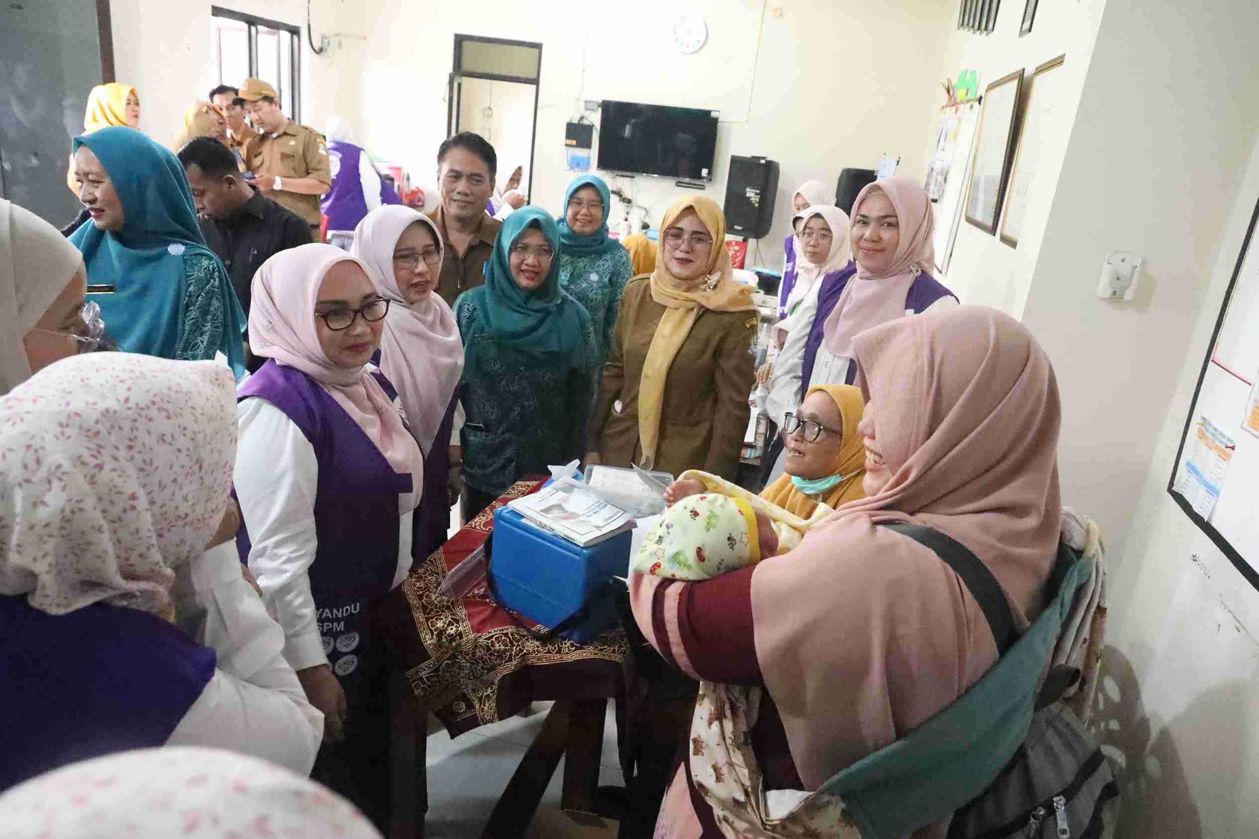 Monitoring 6 SPM, TP PKK Kota Bekasi Perkuat Edukasi Vaksinasi dan Transformasi Layanan Terpadu